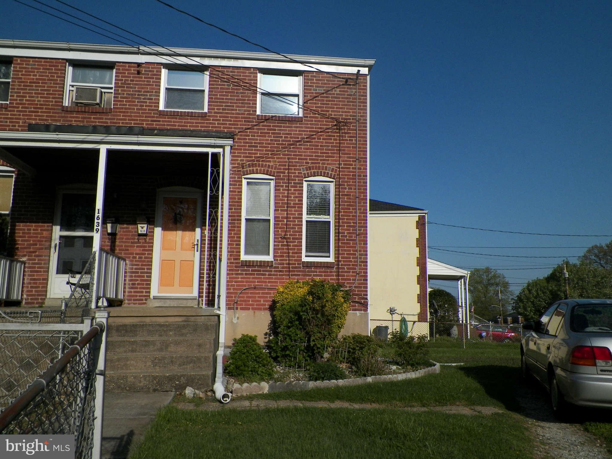 1639 Yakona Road Baltimore, MD 21286 - Photo 2 of 16 a front view of a house with garden