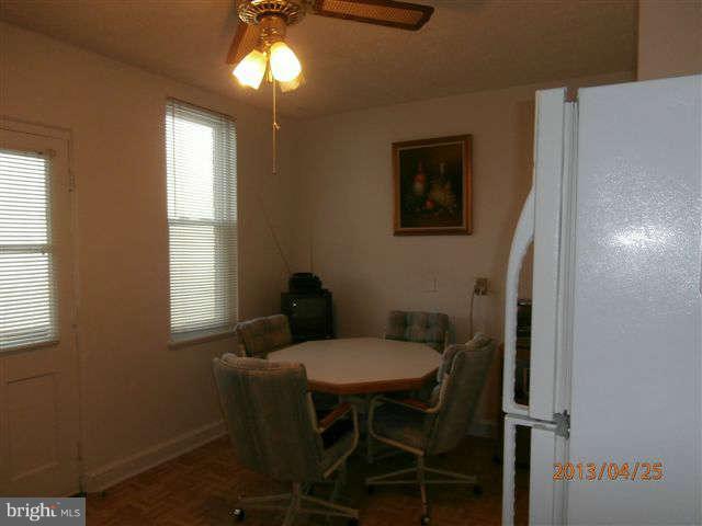1639 Yakona Road Baltimore, MD 21286 - Photo 7 of 16 a view of a dining room with furniture and window