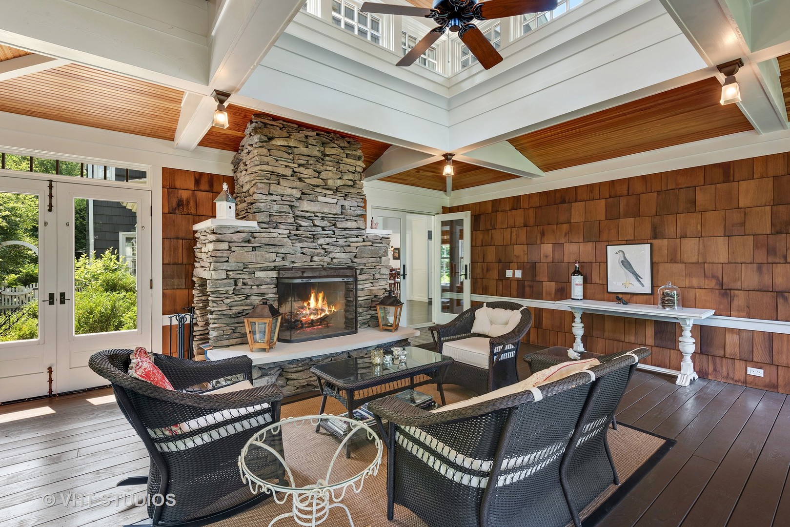 853 Valley Road Glencoe, IL 60022 - Photo 11 of 30 a living room with couches chairs and a fireplace