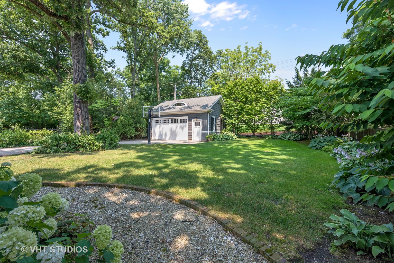 853 Valley Road Glencoe, IL 60022 - Photo 26 of 30 a view of a house with a yard