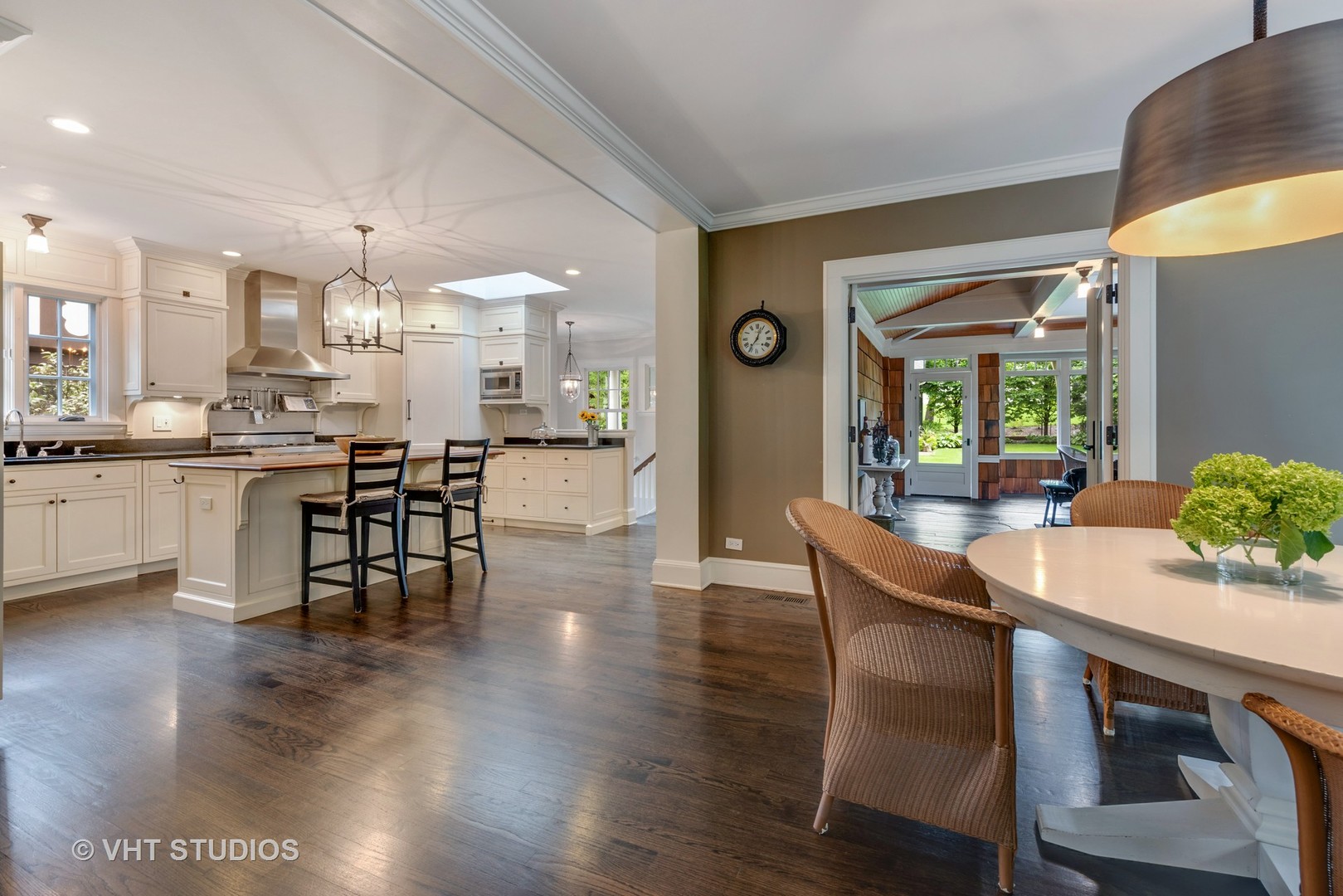 853 Valley Road Glencoe, IL 60022 - Photo 9 of 30 a view of a dining room with furniture and wooden floor