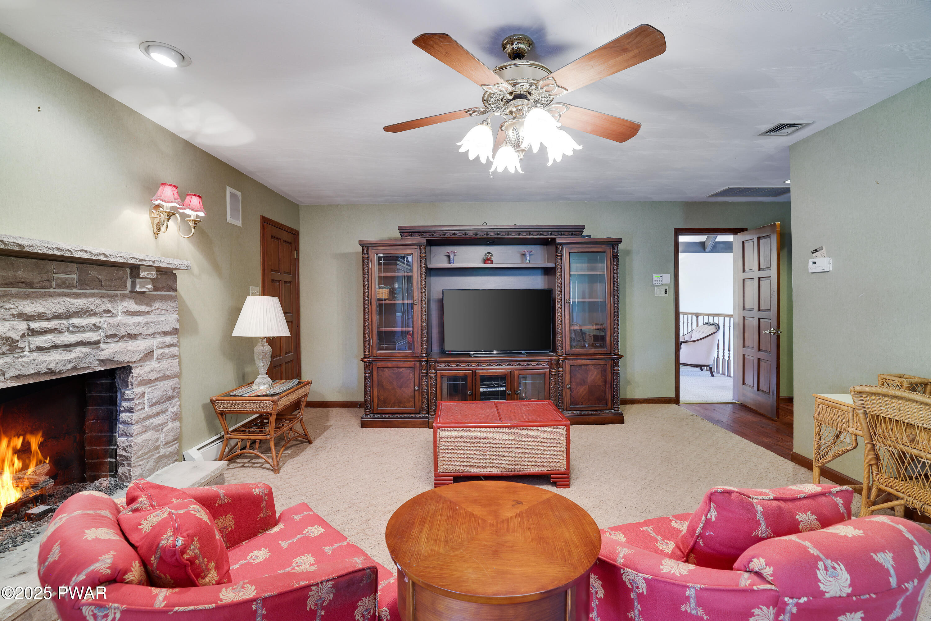 555 Valley View Road Dallas, PA 18612 - Photo 51 of 99 a living room with furniture and a flat screen tv