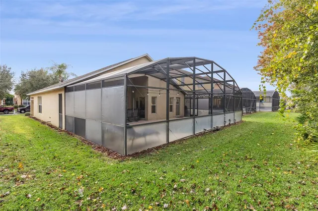 an aerial view of a house with a ocean view