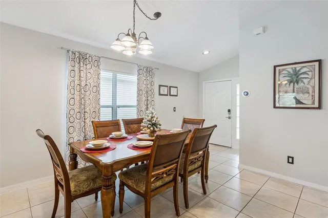 a view of a dining room with furniture