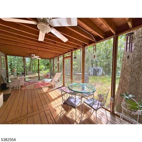 1036 Potts Mill Road Bordentown, NJ 08505 - Photo 31 of 48 a backyard of a house with table and chairs