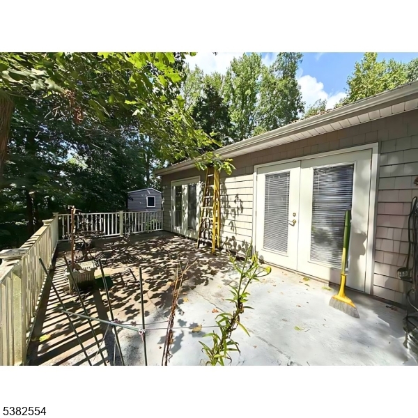 1036 Potts Mill Road Bordentown, NJ 08505 - Photo 45 of 48 a view of a patio with table and chairs and potted plants
