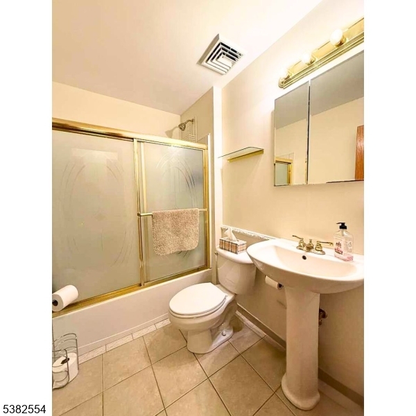 1036 Potts Mill Road Bordentown, NJ 08505 - Photo 10 of 48 a bathroom with a sink toilet and shower