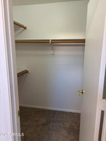 a bathroom with a tub and shower