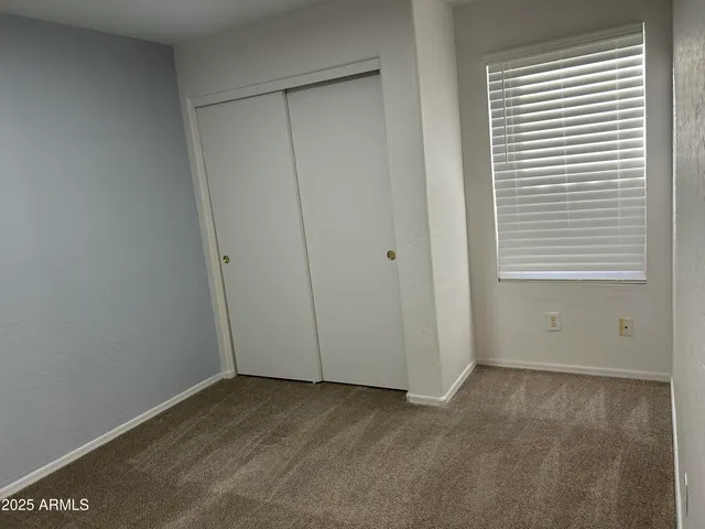 a group of cars parked on the side of a street