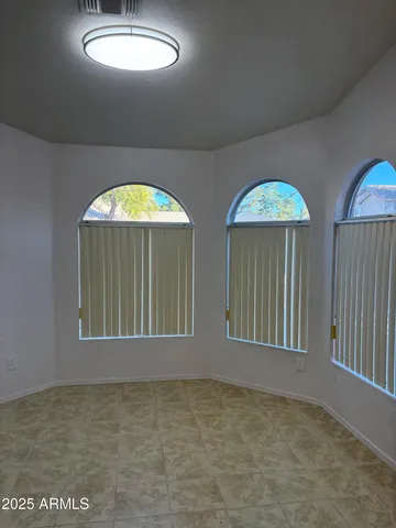a view of a livingroom with wooden floor