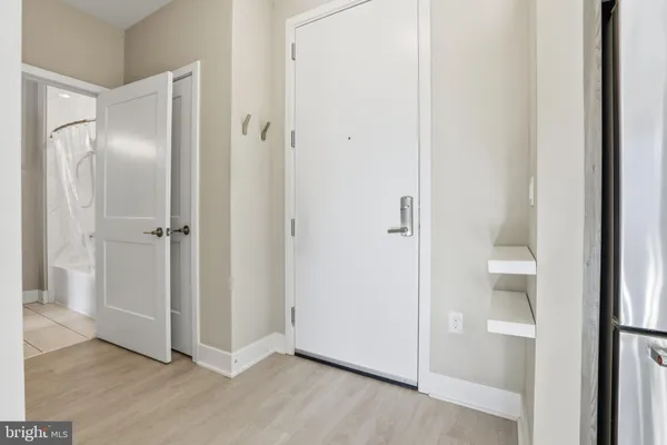 a view of a bathroom with a glass door