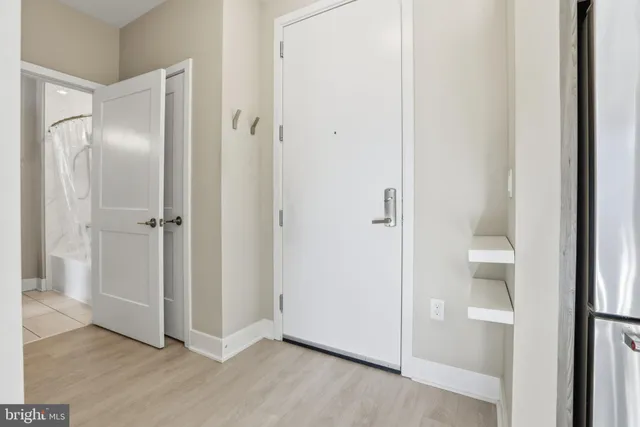a view of a bathroom with a glass door