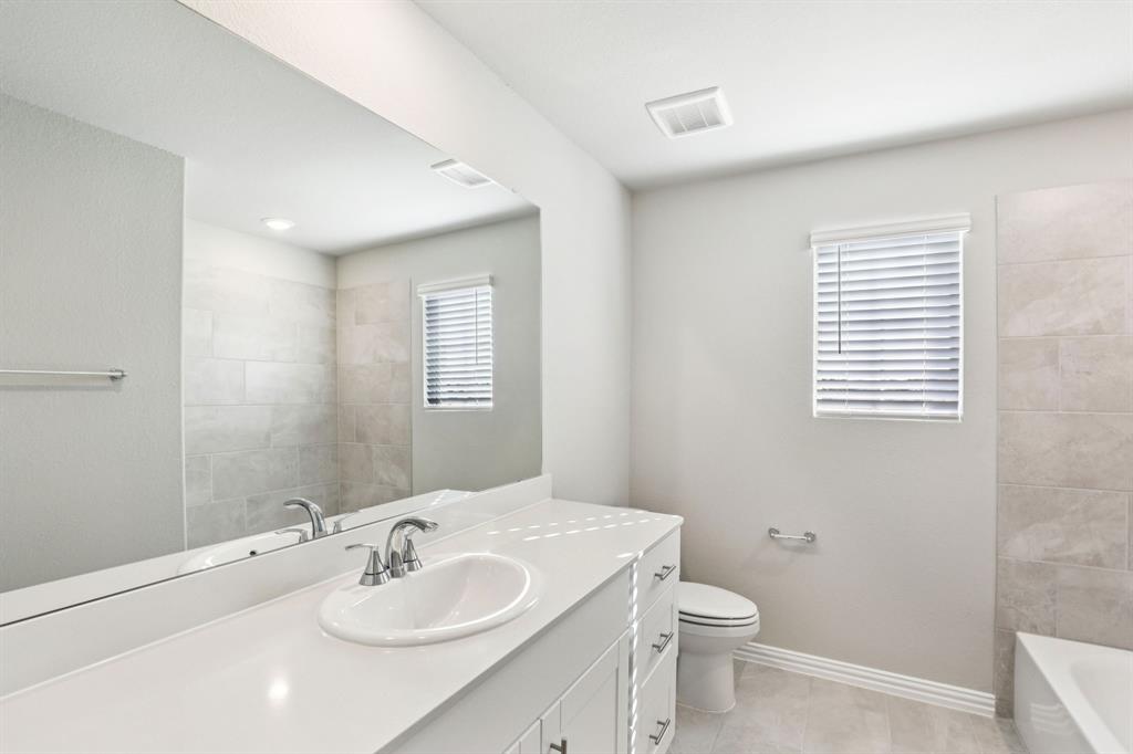 1721 Arches Road Anna, TX 75409 - Photo 20 of 22 Photo is not of the actual home, but is an inspirational photo of builder’s model home and may depict options, furnishings, and/or decorator features that are not included.