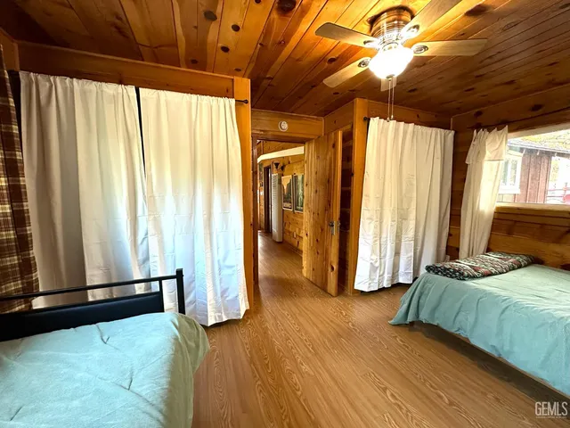 a bed room with a bed and a window