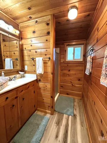 a bathroom with a sink and a shower
