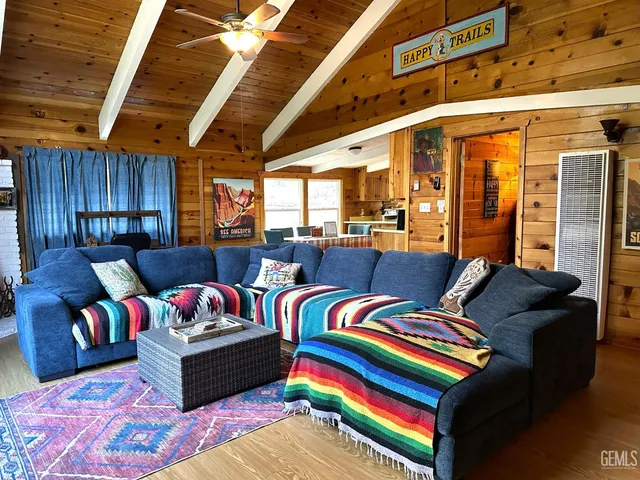 a living room with furniture and a couch