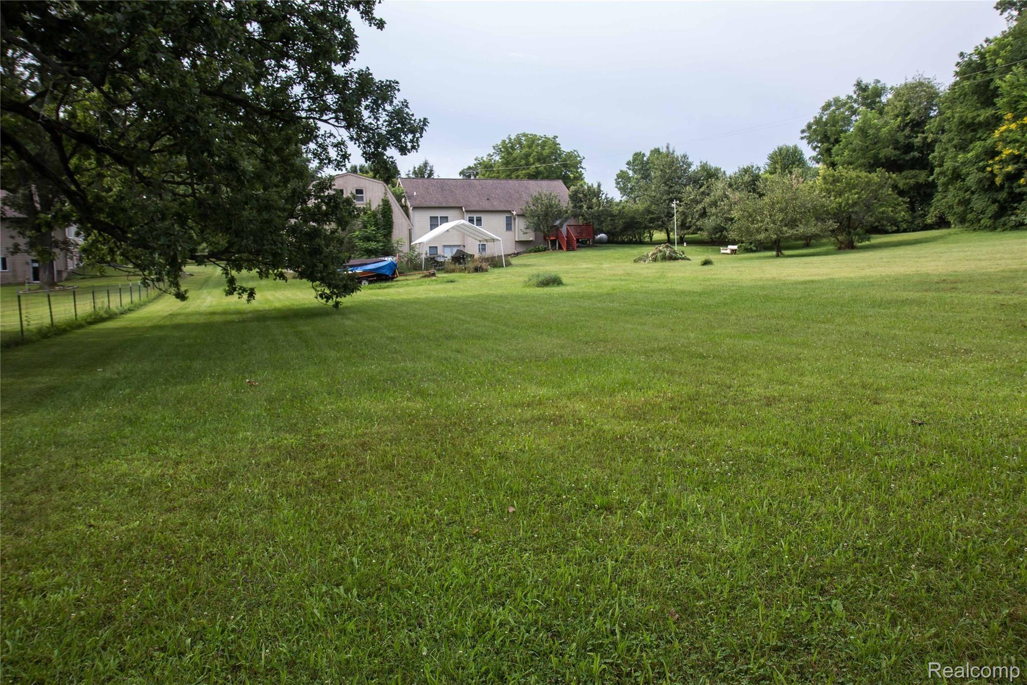 5600 West Coon Lake Road Howell, MI 48843 - Photo 17 of 22 back4.jpg