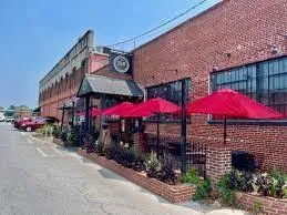 a view of a cafe with sitting area