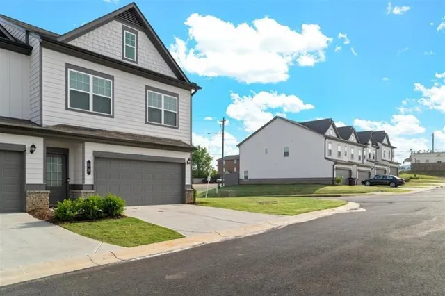 a big house with a big yard and more windows