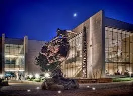 a view of a building with a street
