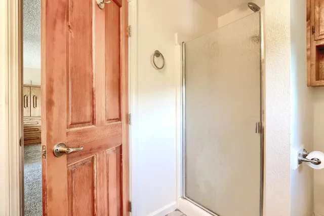 a view of a bathroom with a shower