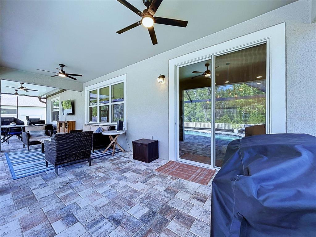 18078 Romanesque Court Spring Hill, FL 34610 - Photo 59 of 81 a living room with furniture and a window