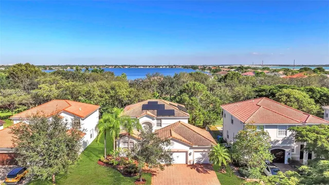an aerial view of a house with a garden