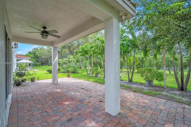 a view of a garden with porch