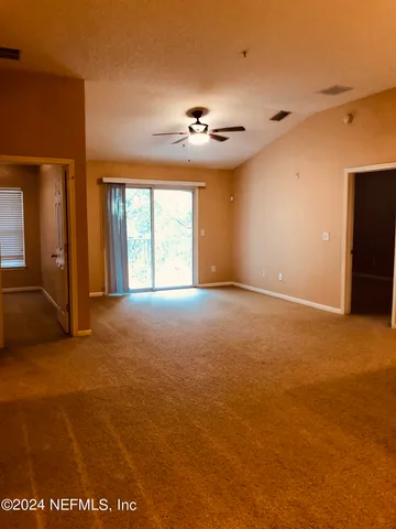 a view of a kitchen with a sink