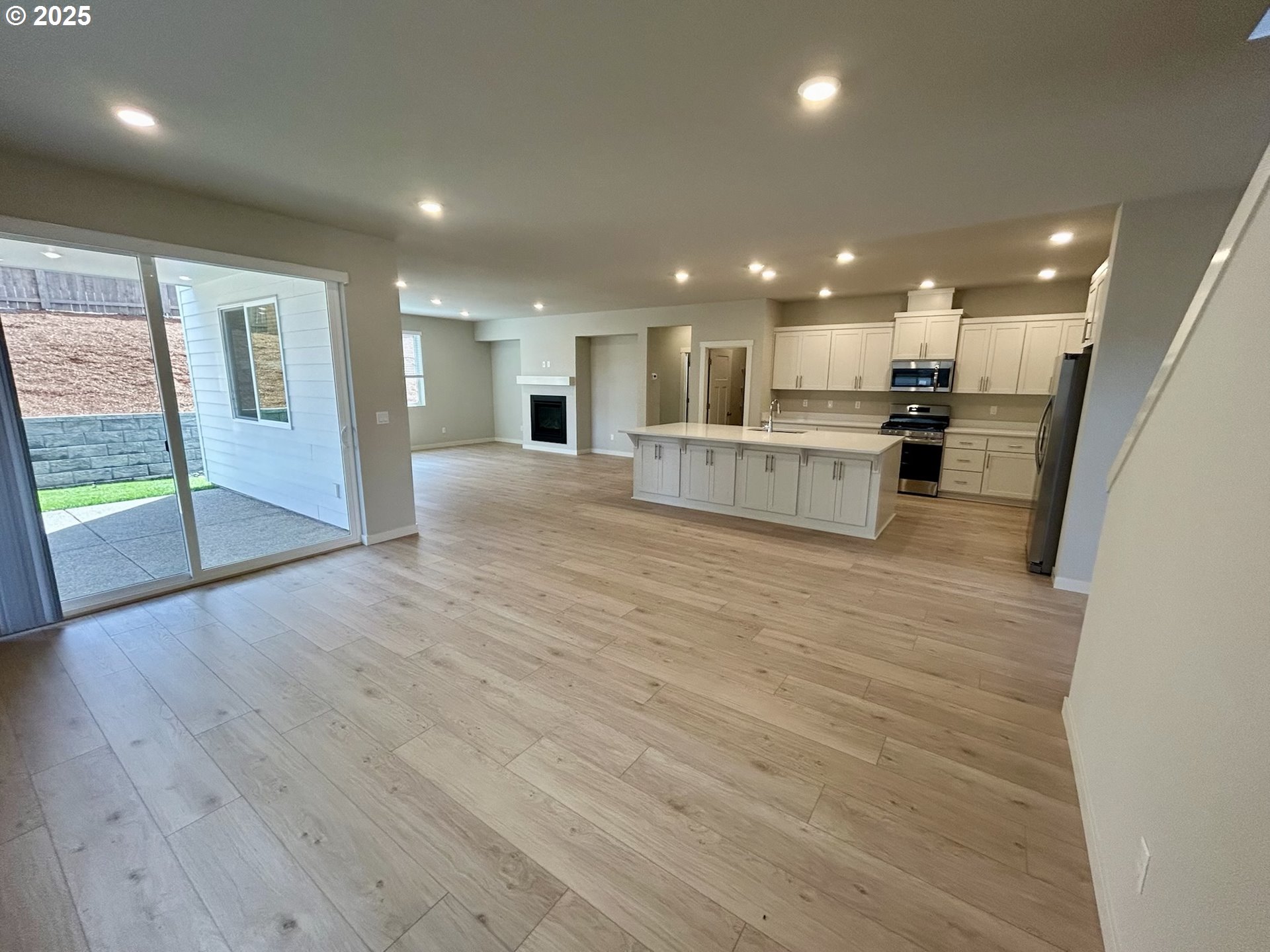 14956 Southwest 165th Avenue Tigard, OR 97224 - Photo 28 of 43 a view of kitchen with cabinets and wooden floor