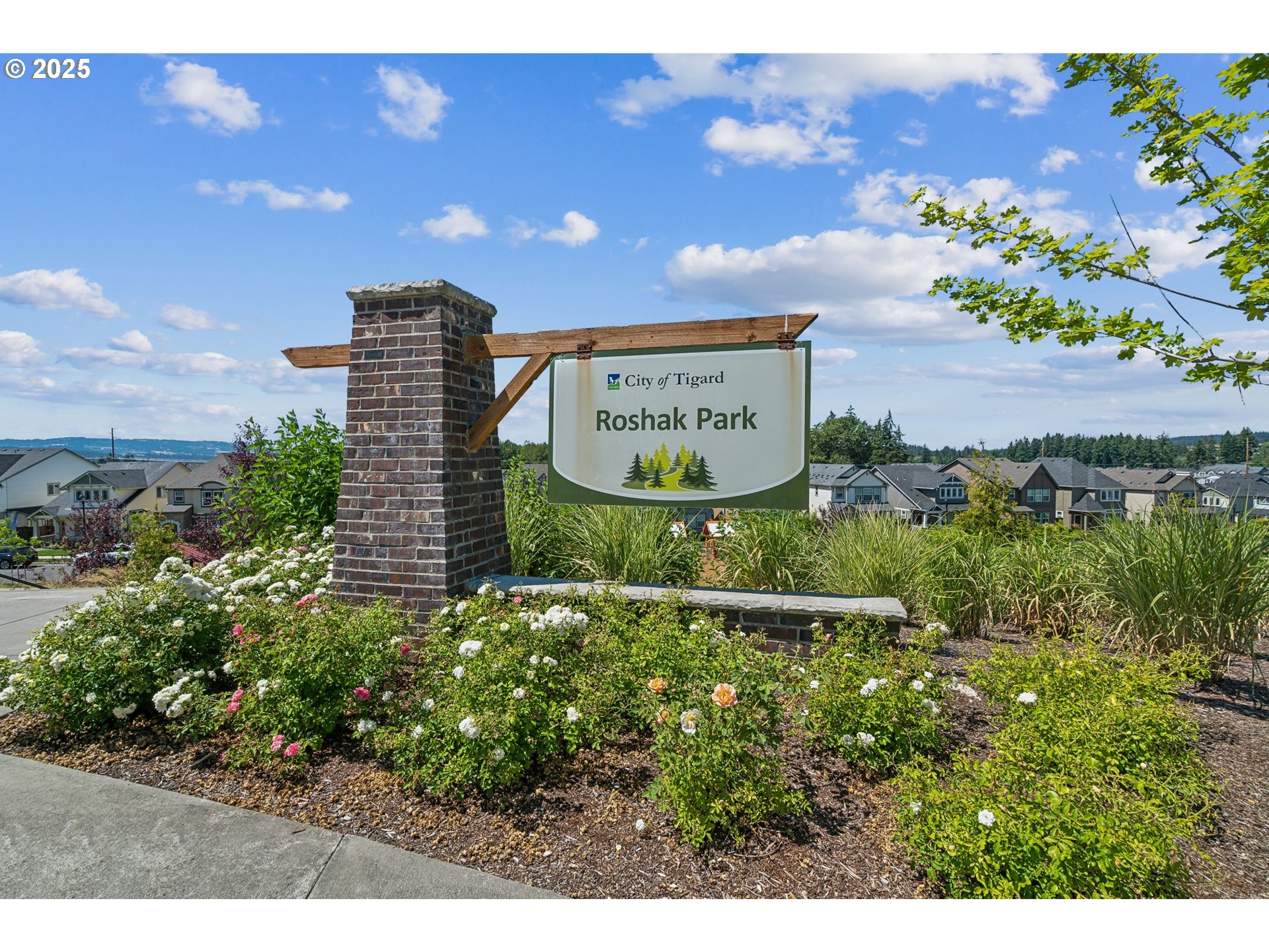 14956 Southwest 165th Avenue Tigard, OR 97224 - Photo 39 of 43 a sign that is on a brick wall