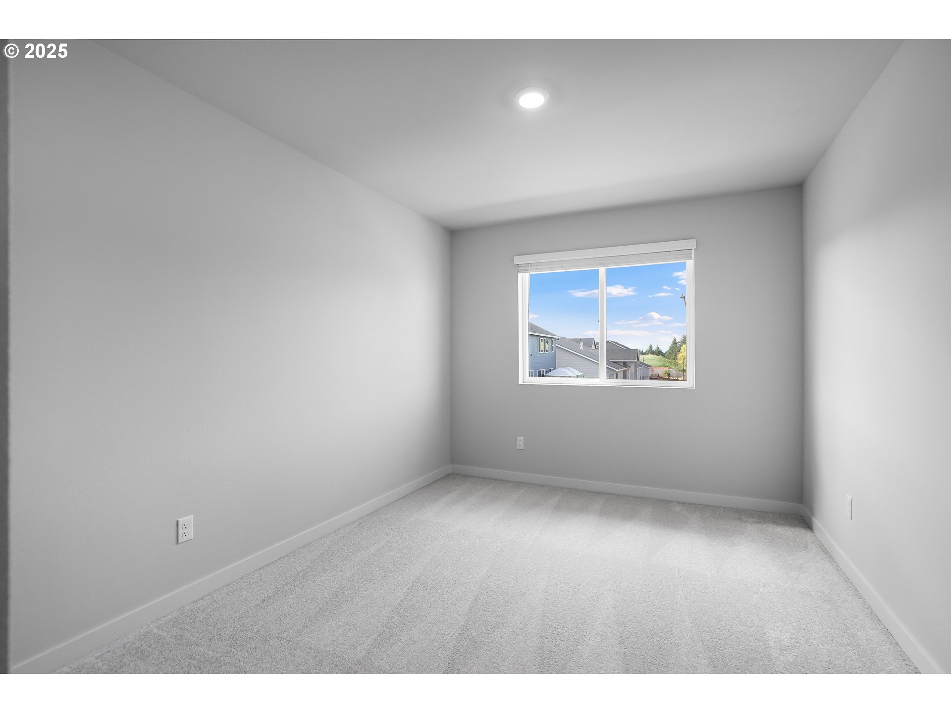14956 Southwest 165th Avenue Tigard, OR 97224 - Photo 42 of 43 an empty room with wooden floor and windows
