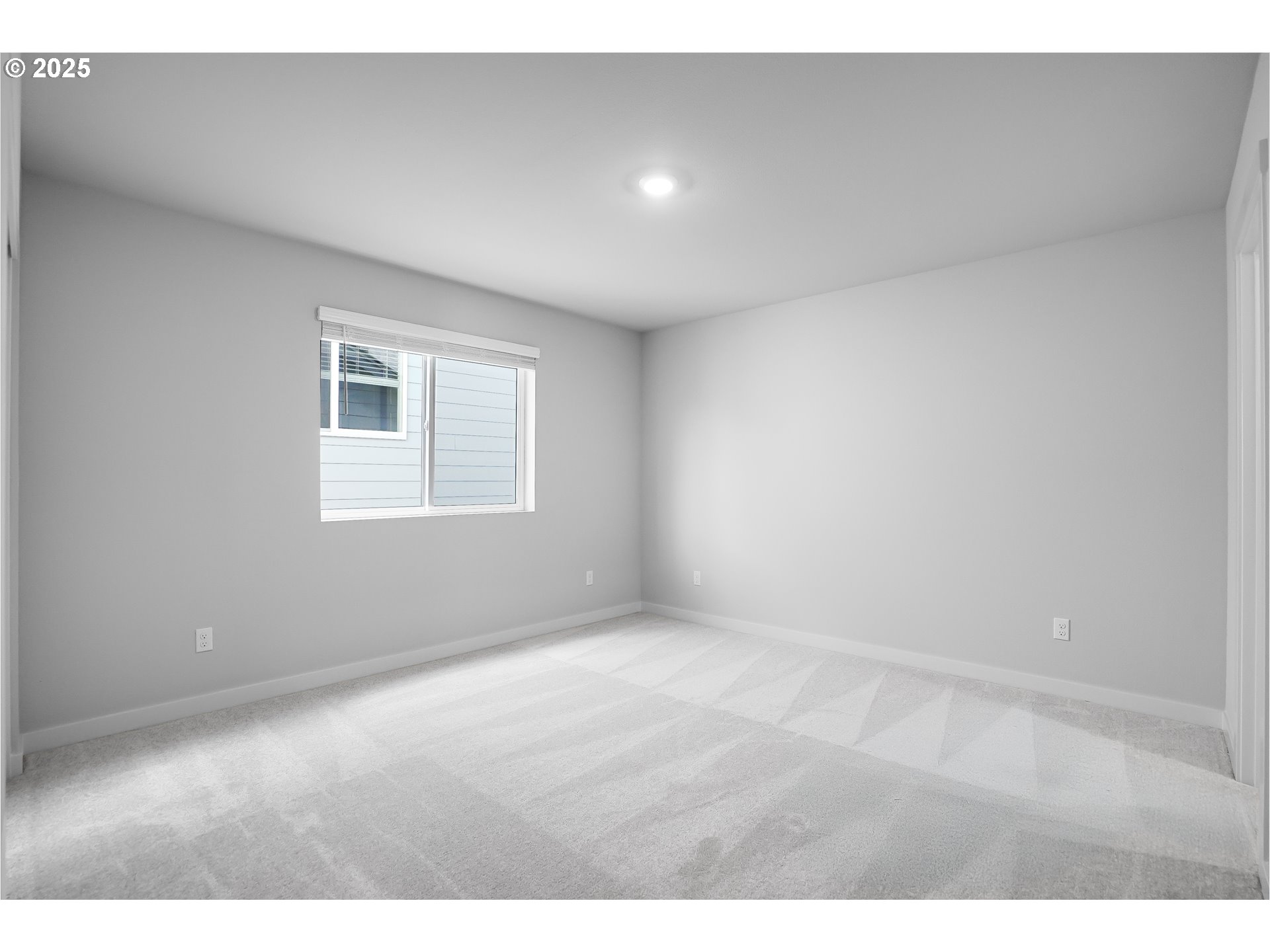14956 Southwest 165th Avenue Tigard, OR 97224 - Photo 43 of 43 a view of an empty room with a window