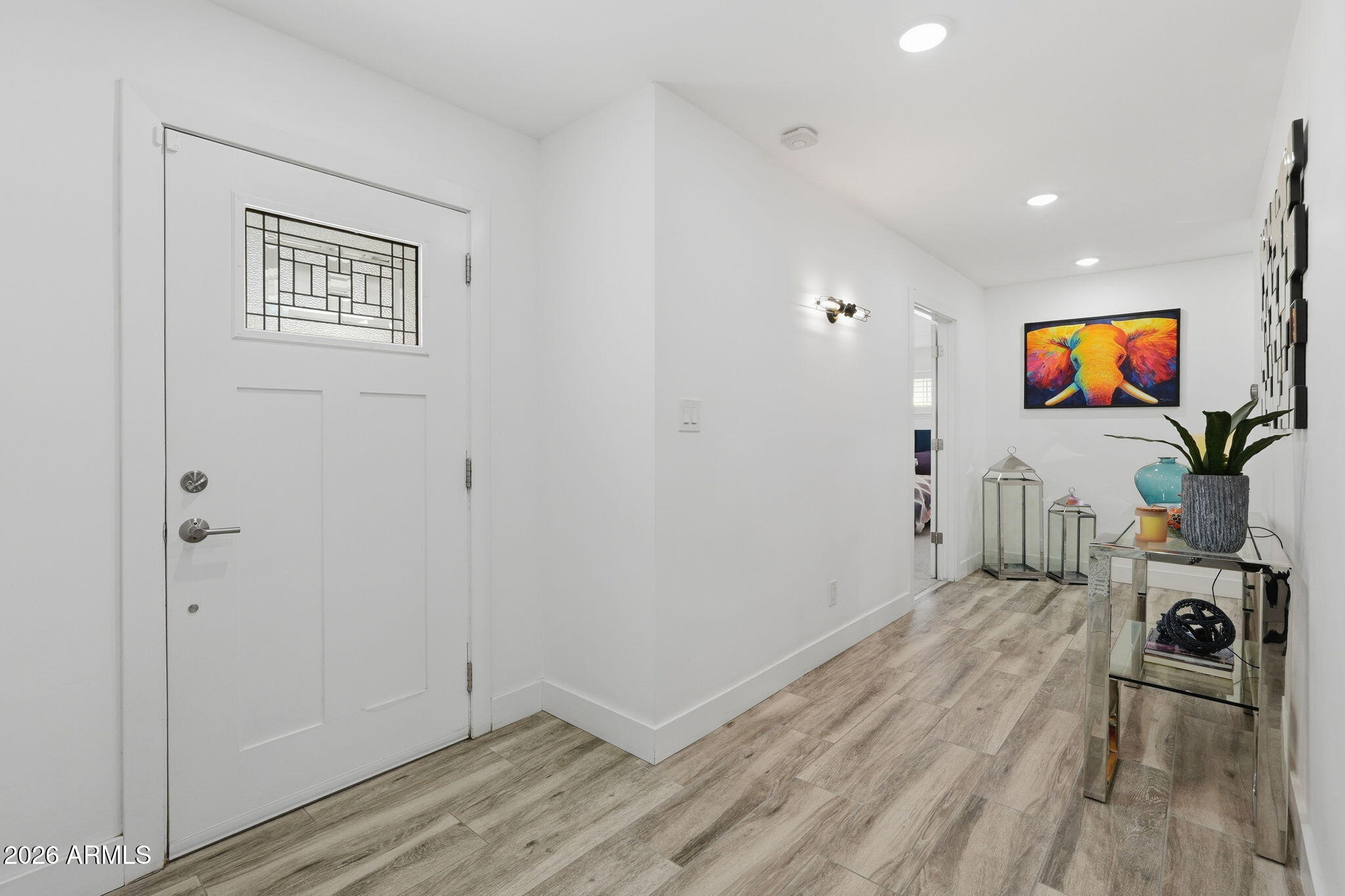 5149 North 34th Street Phoenix, AZ 85018 - Photo 11 of 70 a view of a livingroom with wooden floor