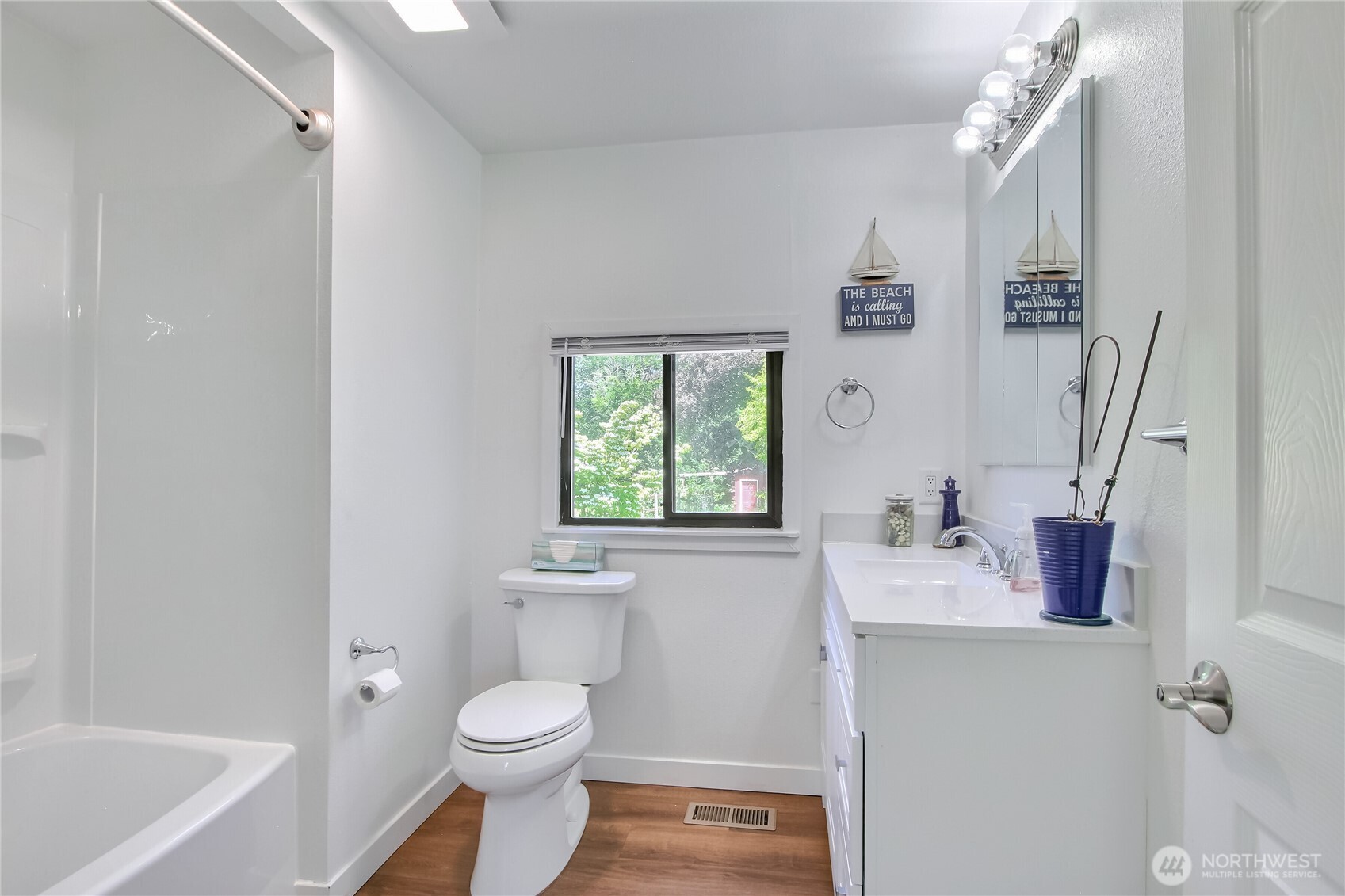 13610 Southeast 288th Street Kent, WA 98042 - Photo 13 of 32 a bathroom with a sink toilet and shower