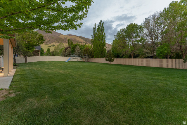 1712 Somerset Ridge Drive Draper, UT 84020 - Photo 71 of 76 Expansive green lawn with a privacy fence