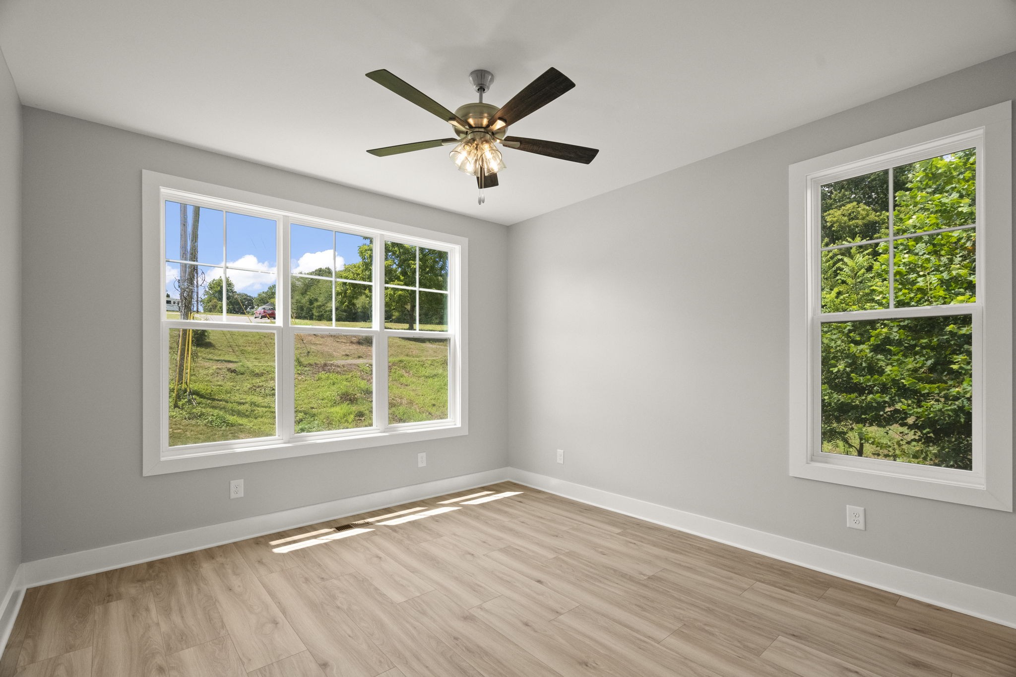 4062 Summit Drive Greenbrier, TN 37073 - Photo 19 of 36 a view of an empty room with wooden floor and a window