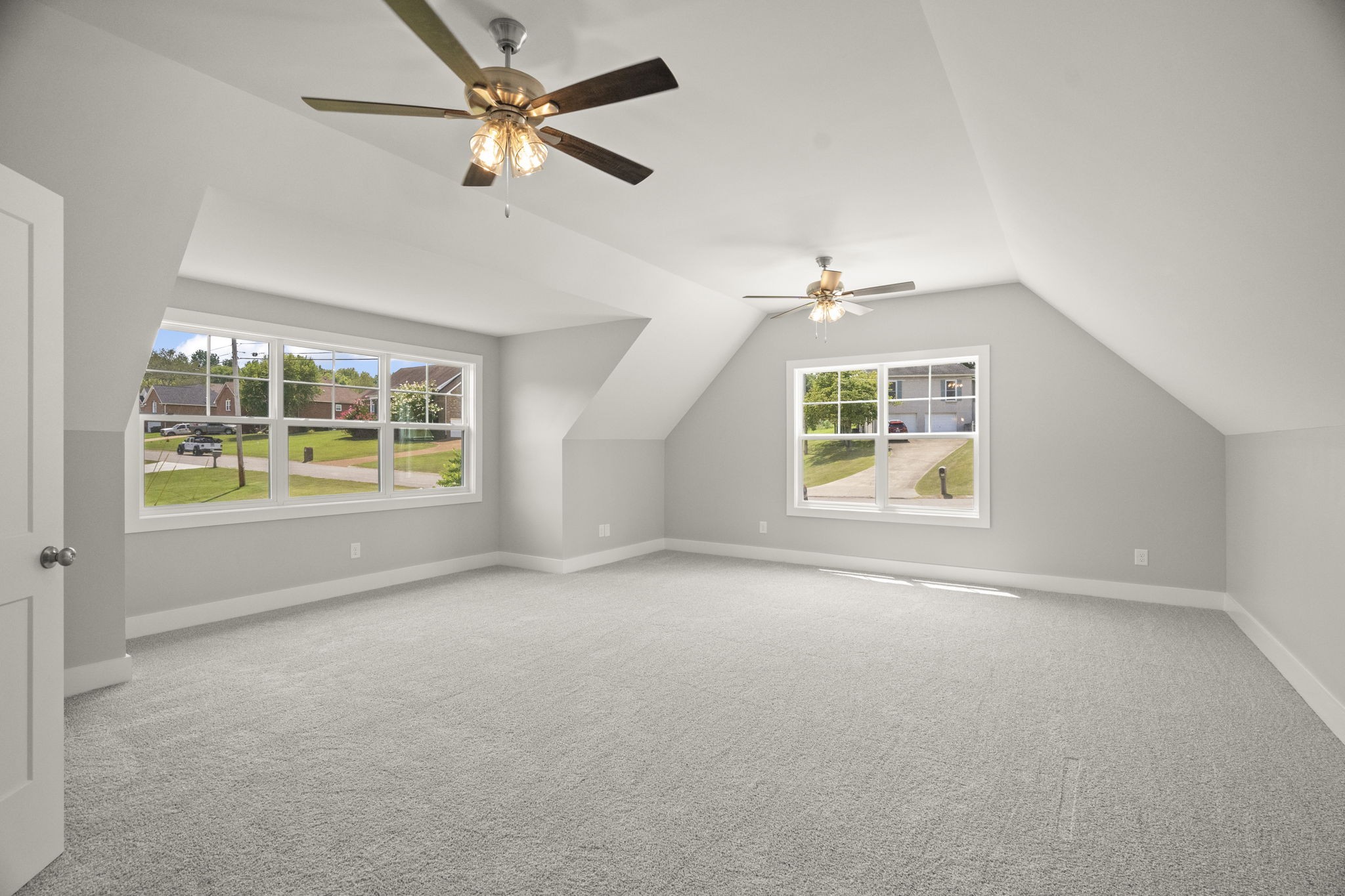 4062 Summit Drive Greenbrier, TN 37073 - Photo 26 of 36 an empty room with windows and fan