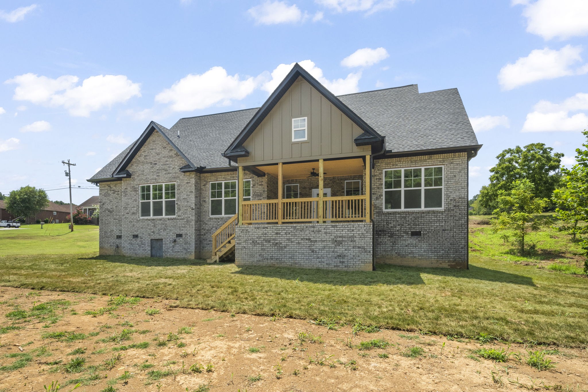 4062 Summit Drive Greenbrier, TN 37073 - Photo 33 of 36 a front view of a house with a garden