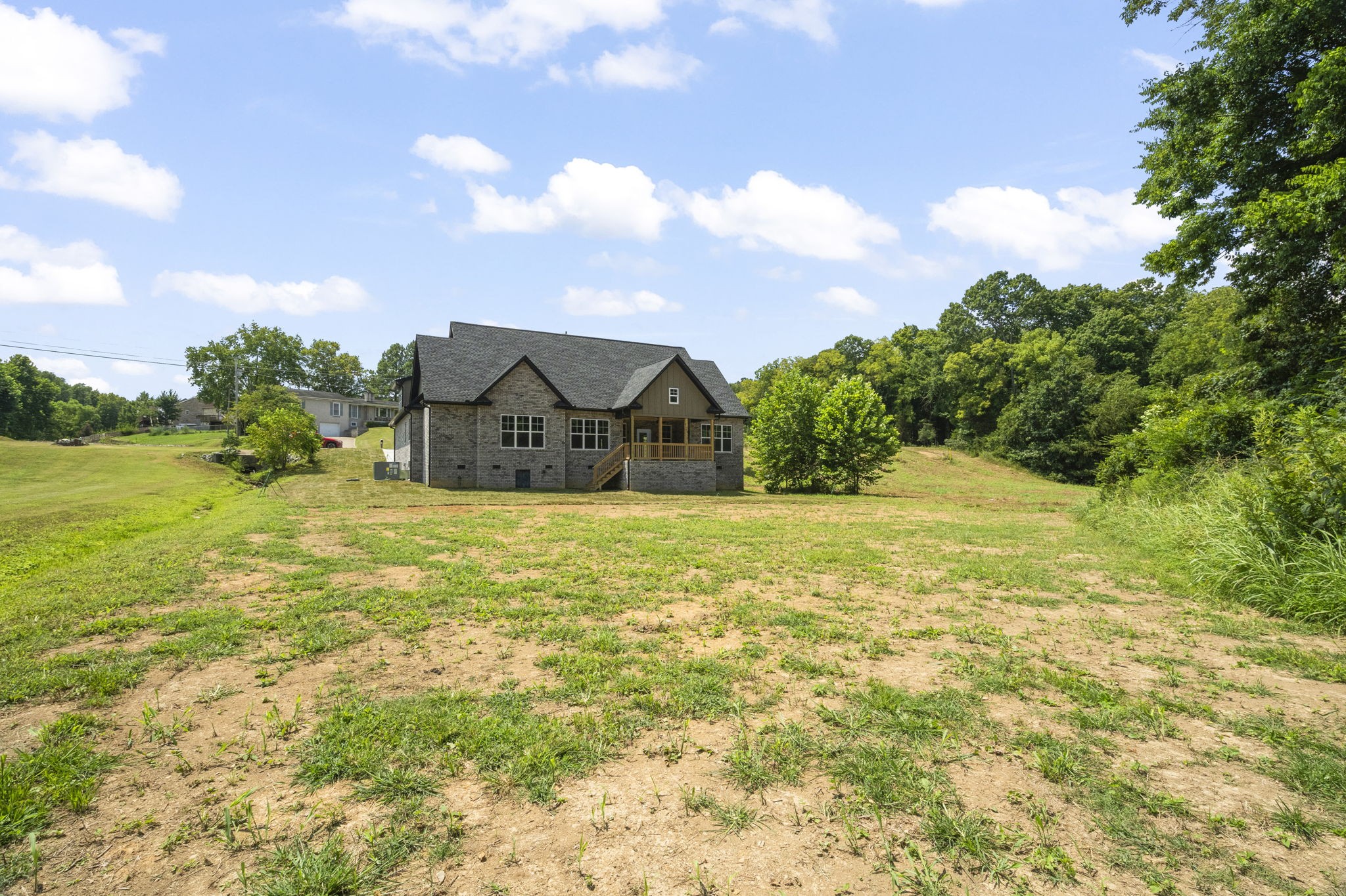 4062 Summit Drive Greenbrier, TN 37073 - Photo 34 of 36 a view of a house with a yard