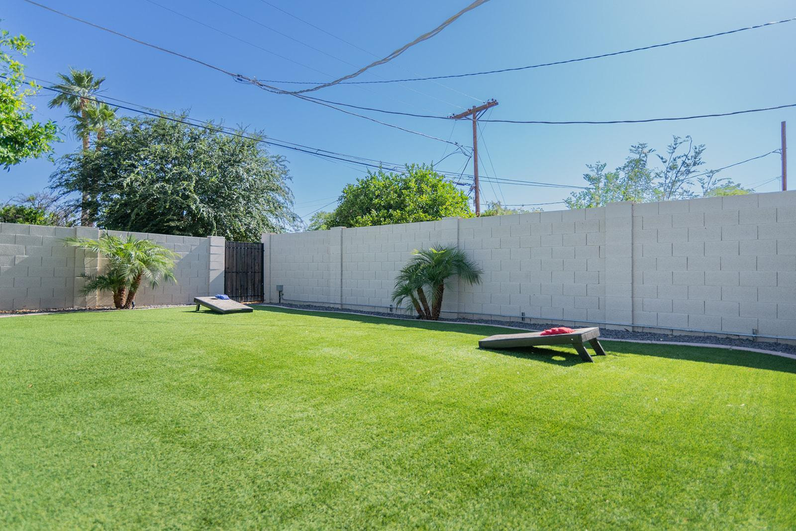 7435 East Granada Road Scottsdale, AZ 85257 - Photo 2 of 28 a backyard of a house with lots of green space