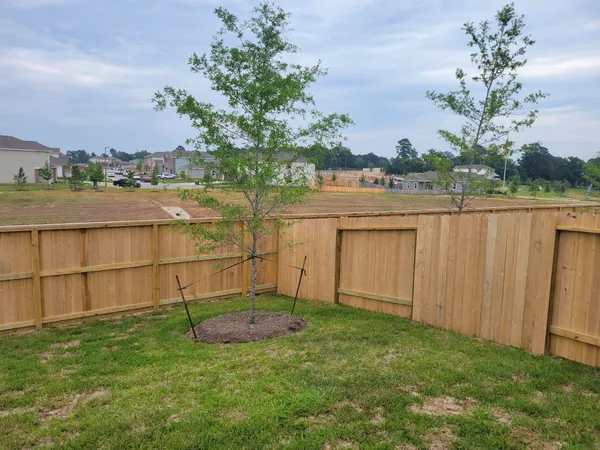a view of a lake with a big yard
