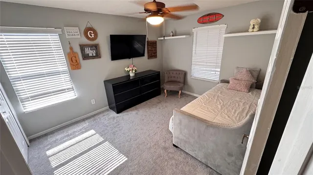 a view of an empty room with shelves