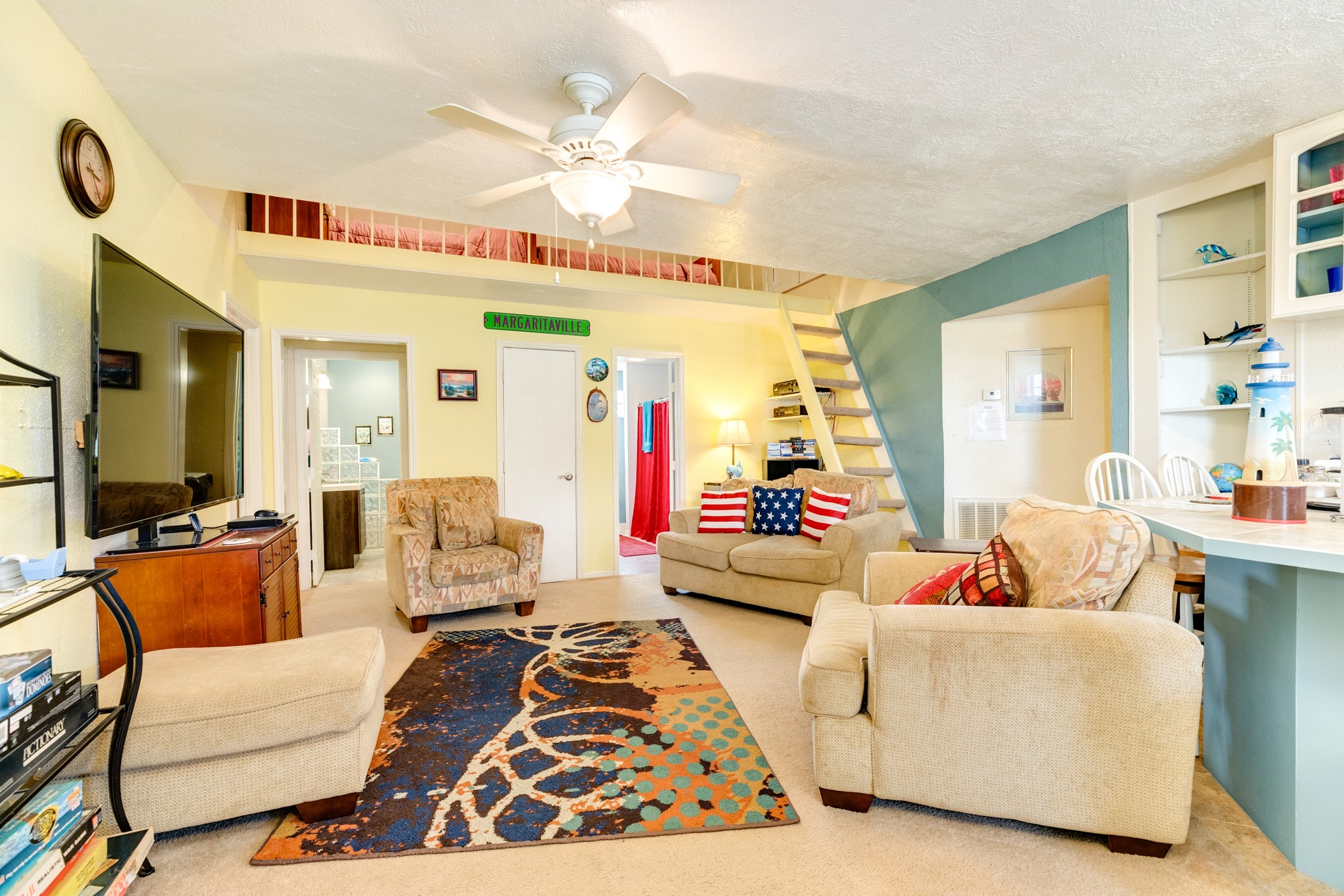 211 Pompano Lane Surfside Beach, TX 77541 - Photo 18 of 44 a living room with furniture and a large window