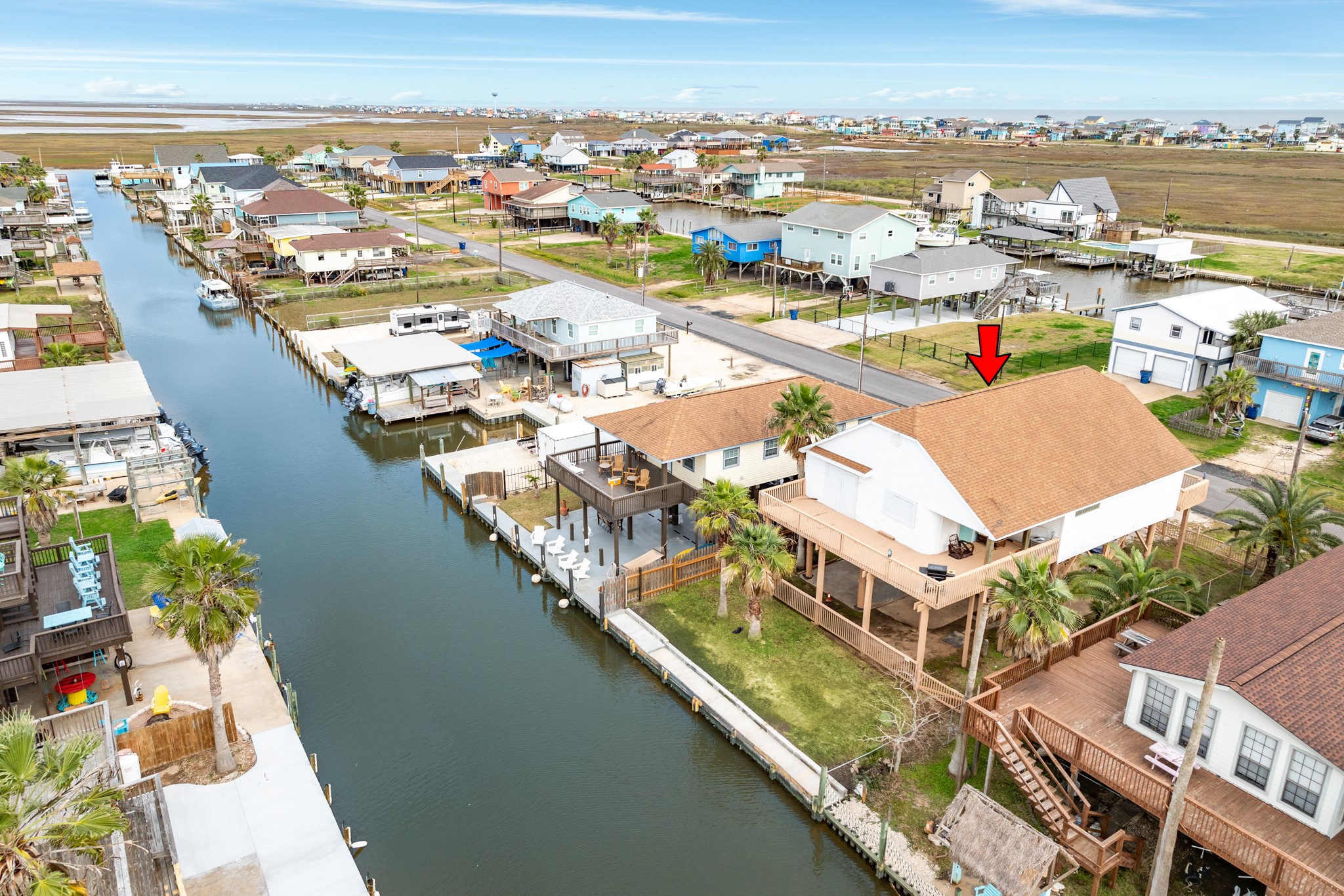 211 Pompano Lane Surfside Beach, TX 77541 - Photo 3 of 44 a view of a city from a terrace