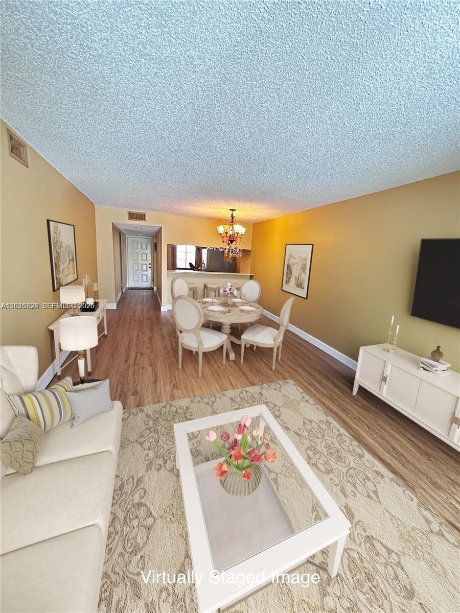 9577 West McNab Road, Unit 110 Tamarac, FL 33321 - Photo 6 of 29 Virtually Staged.