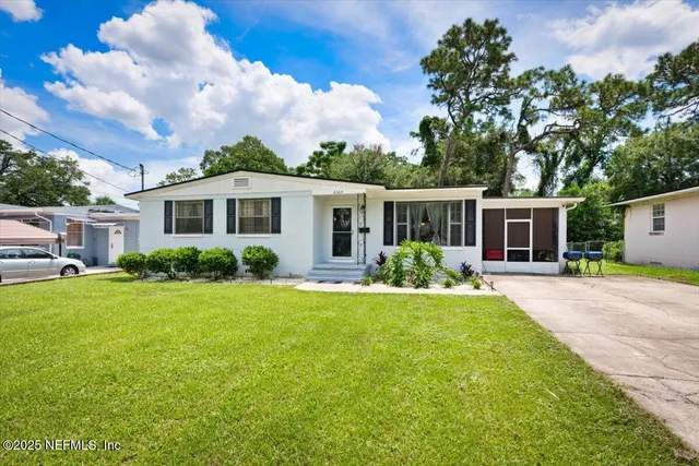 front view of a house with a yard