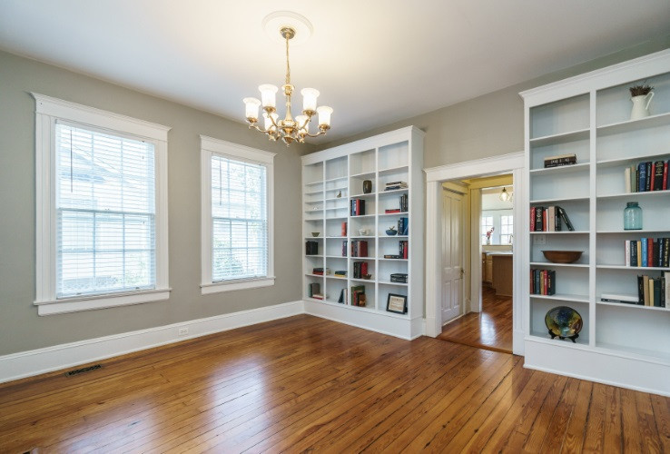504 Cleveland Street Raleigh, NC 27605 - Photo 10 of 25 This is the versatile middle room that can be a book-lined den/library or dining room or both.
