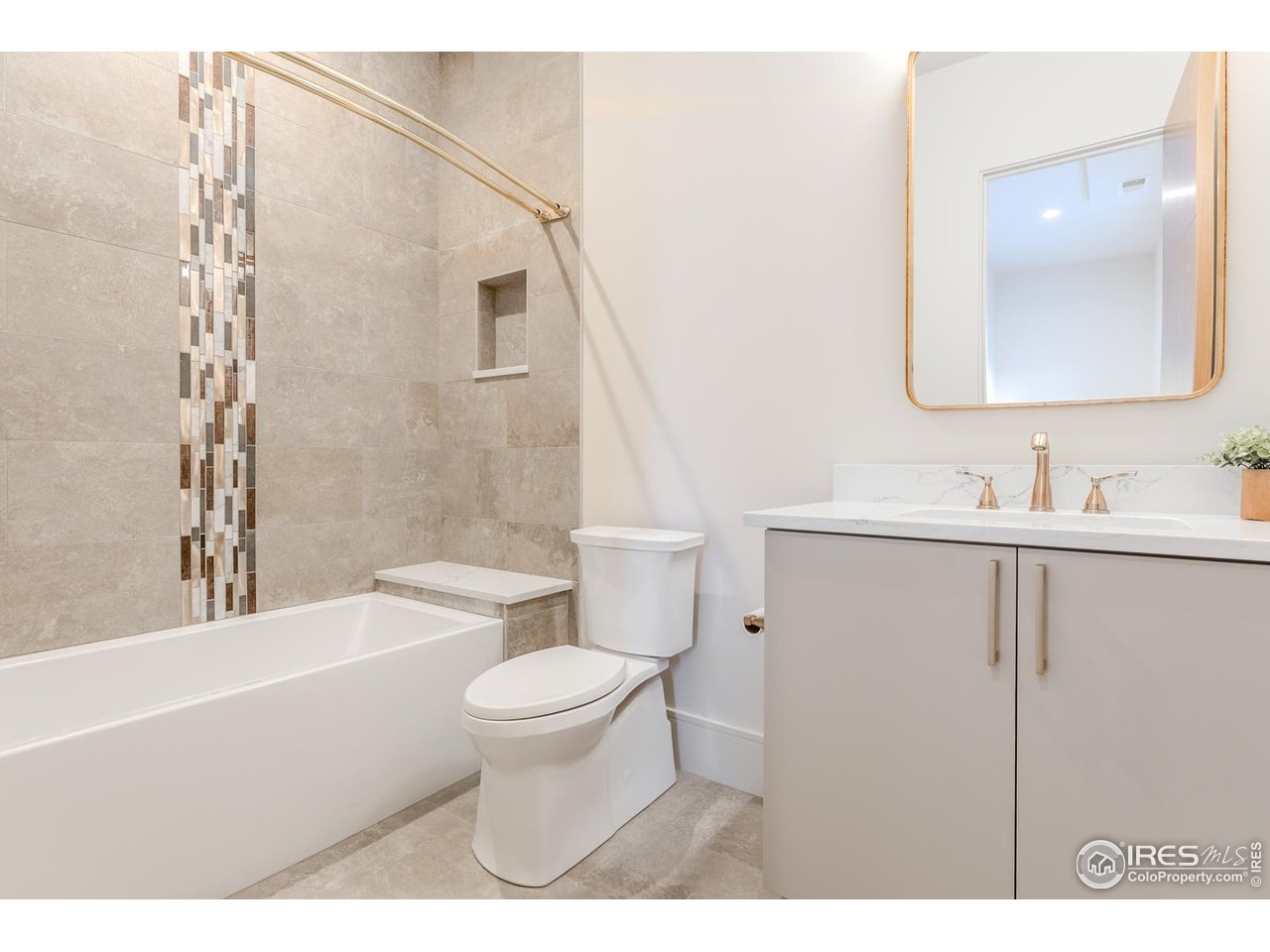 7572 Raphael Lane Littleton, CO 80125 - Photo 36 of 50 Each bedroom is outfitted with an ensuite bathroom for privacy and convenience, offering a personal retreat.