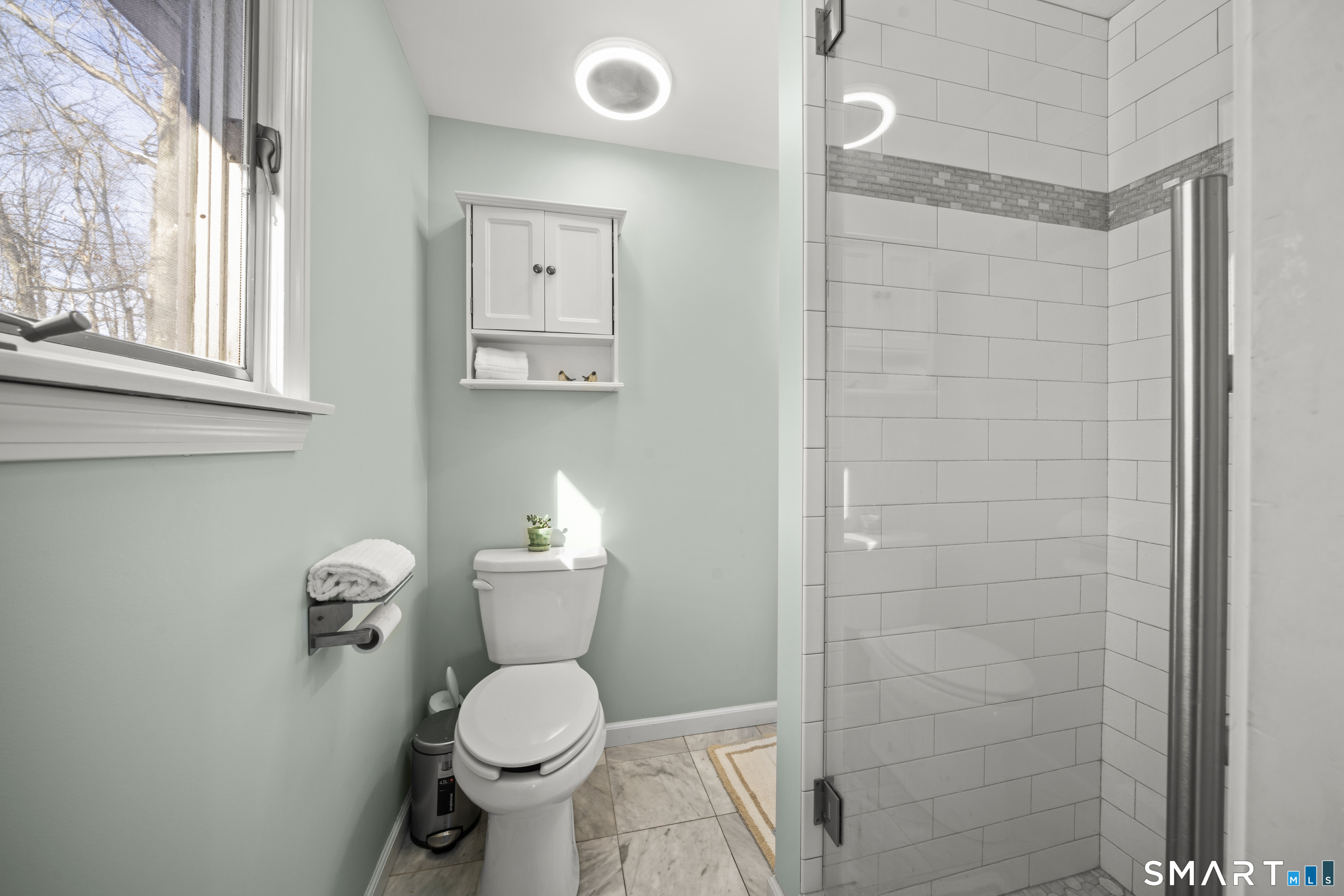 51 Barrett Road Enfield, CT 06082 - Photo 17 of 35 a bathroom with a toilet and a shower